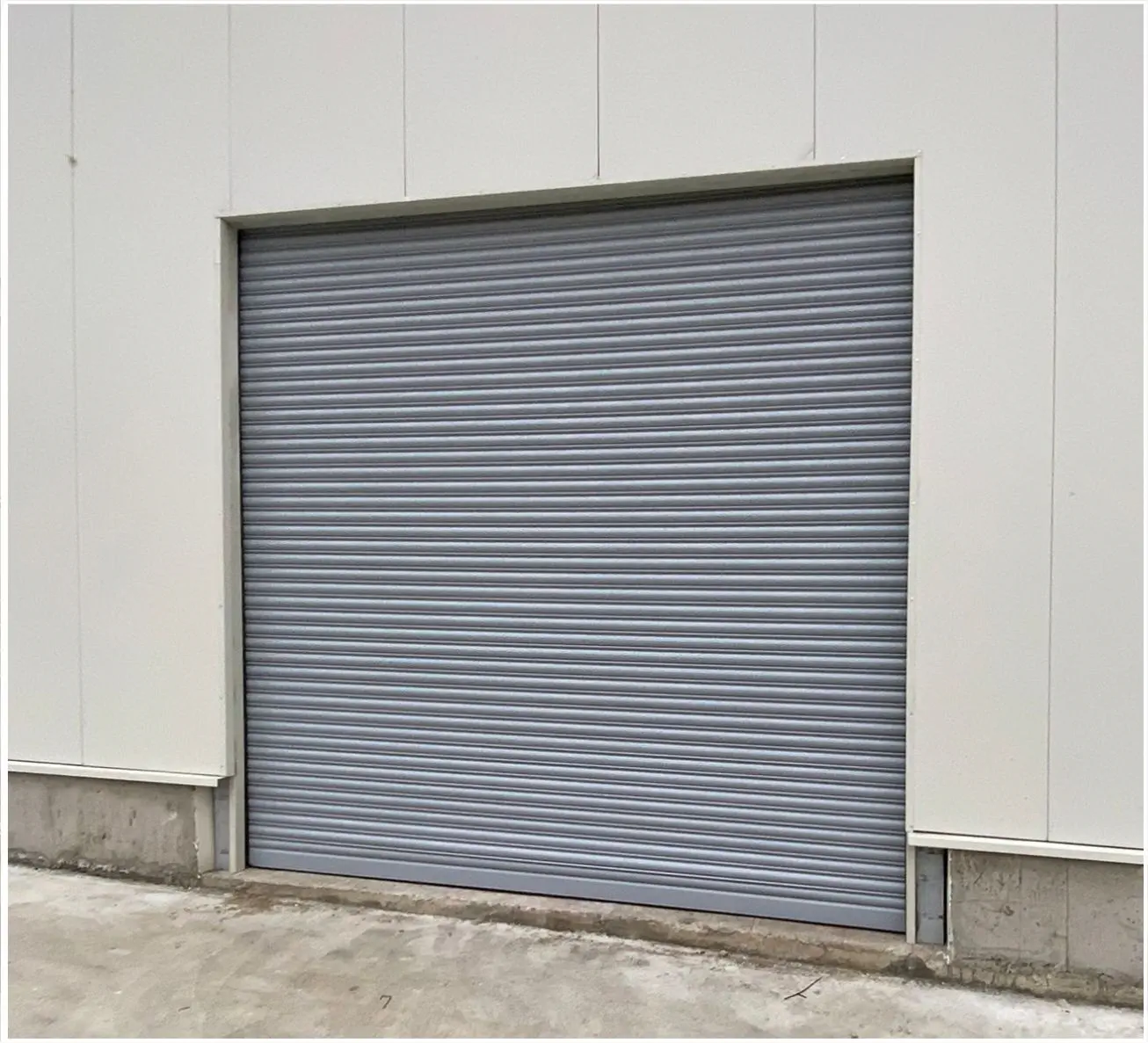 Fire-rated spiral safety door in an industrial building
